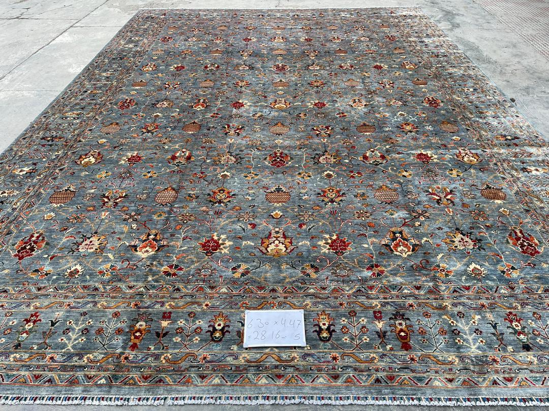 Afghan hand-knotted rug in Ghazni highland wool, 447 by 630 cm, tied one knot at a time on the loom
